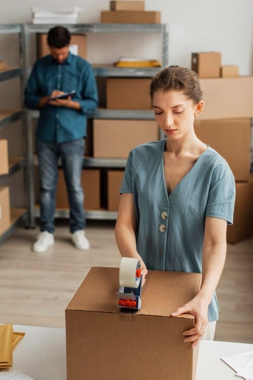 delivery-employees-working-together_23-2148890052